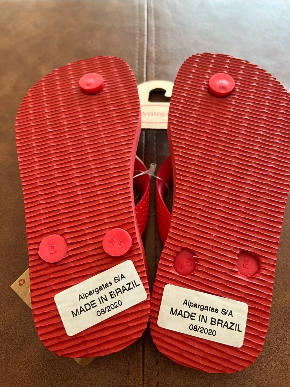 Havaians red flip flops sz 11